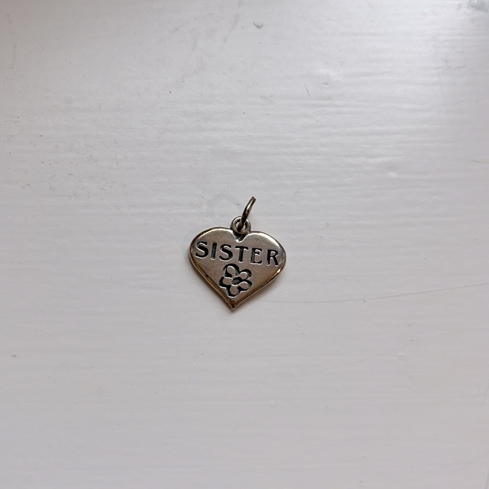 SJC Sister charm
